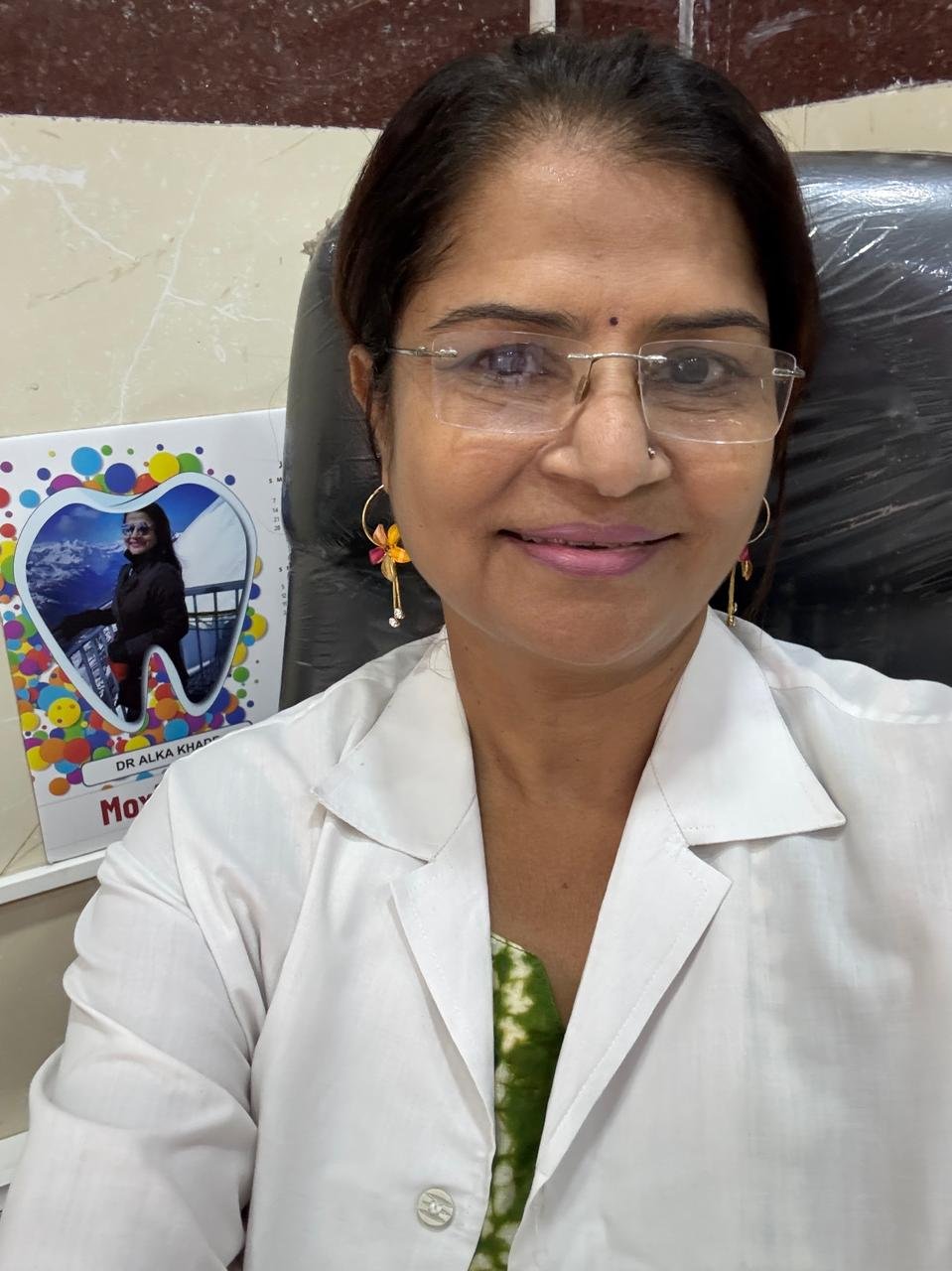 Dr. Alka Khade at her clinic desk