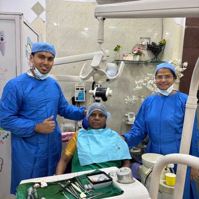 Dr. Alka and her team with a patient after treatment